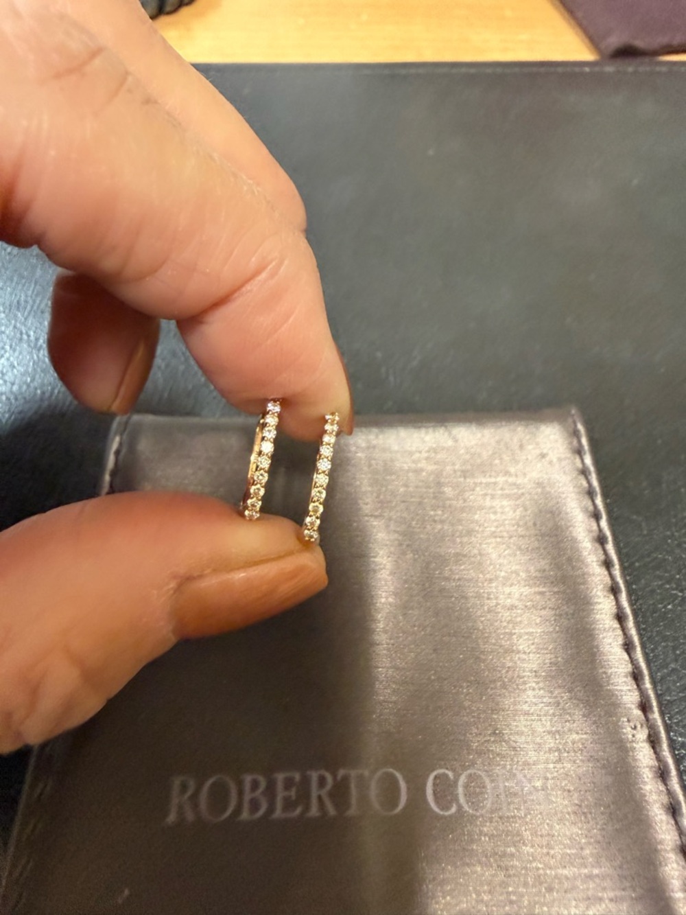 Roberto Coin 18k micro rose gold hoops.